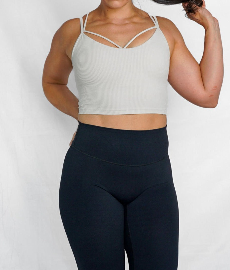 cropped ribbed camisole with built in bra longline sports bra front view in cream