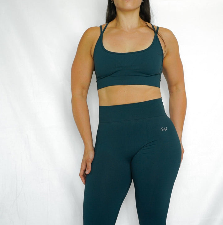 strappy back seamless sports bra with removable cup pads, ultra soft and comfortable front view in Deep Aquamarine